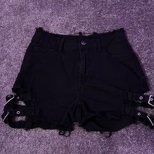 Hardly worn Jean shorts with adjustable buckles on the sides.